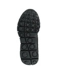 A Bernie Mev black rubber outsole with tred design of circles in squares.