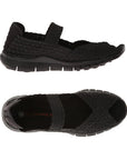 A pair of black Bernie Mev sandals with woven elastic upper,  a peep toe and strap across the top of the foot with a closed in heel, logo'd black footbed and a rocker bottom black outsole.