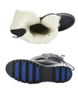 Top view of the Goose Prima boot, displaying white wool lining, and view of the black outsole with G2 Ice Grip technology. 