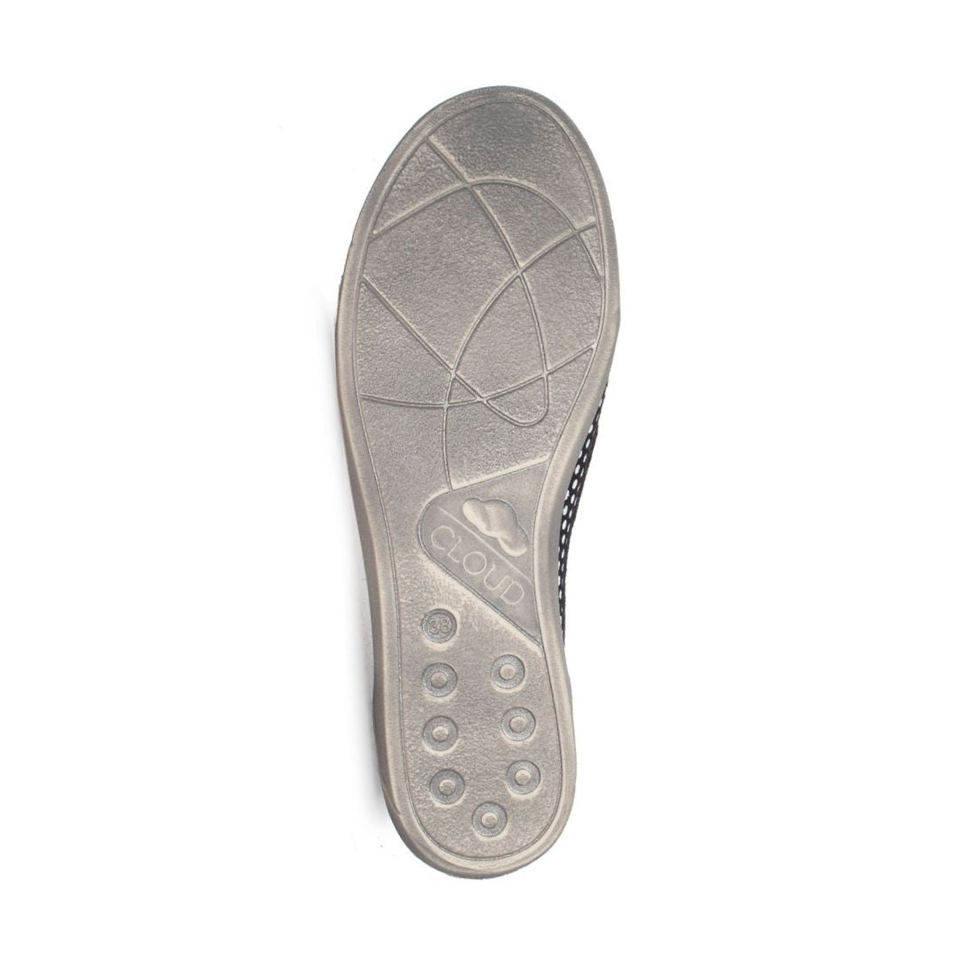 Taupe outsole of Acacia flat in polka.