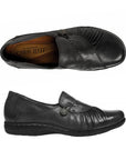 Top and profile view of Paulette loafer in black. Insole is brown, outsole is black. 