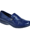 Paulette loafer in navy. A navy blue slip on with gathered leather detailing and a decorative silver button.