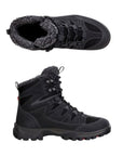 A pair of Ecco black lace-up ankle boots with white contrast stitching and a fuzzy grey cuff. 