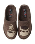 Brown wool open-back slippers. On one foot, there is a felt coffee mug with steam rising out of it, and on the other foot there is a bag of coffee grounds. Haflinger logo is stitched onto the heels. 