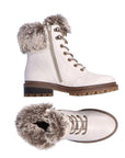 White leather lace-up boot with faux fur cuff and brown outsole. Boot has inside zipper closure