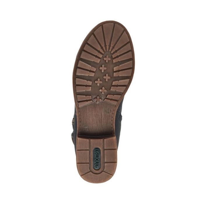 Brown rubber outsole with green Remonte logo on heel.