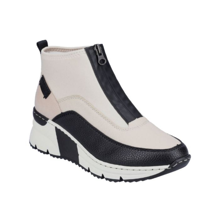 A White Rieker top zipper sneaker with black accents and black and white wedge outsole.