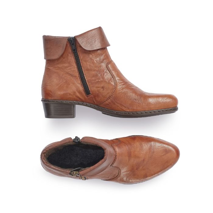 A pair of brown Rieker ankle boots with side zippers on both sides, folded down cuff, detailed stitching, and a low heel.  