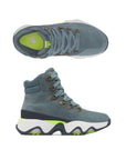 Blue suede leather lace-up boots with white and blue thick wavy outsole. Neon green insole has white Sorel logo printed on heel.