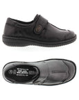 Black slip on shoe with Velcro cross strap with metal detail and detailing stitching from top and side view