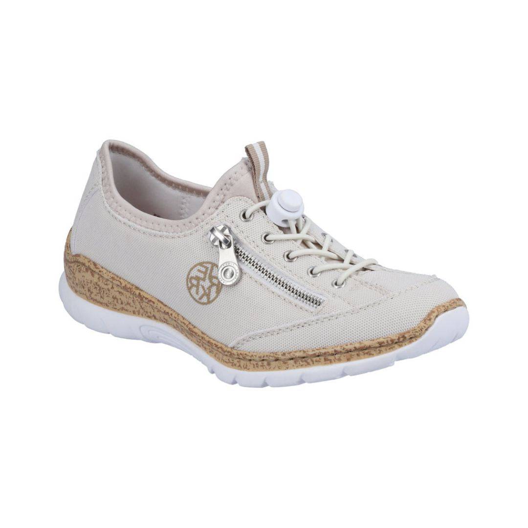 A beige Rieker bungee cord slip-on sneaker with decorative side zipper, cork midsole and white outsole. 