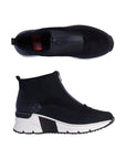 Black top zipper sneaker with white wedge outsole.