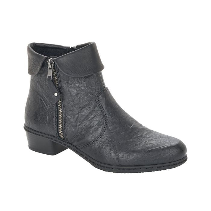 Black Rieker ankle boot with side zipper, folded down cuff, detailed stitching, and a low heel.