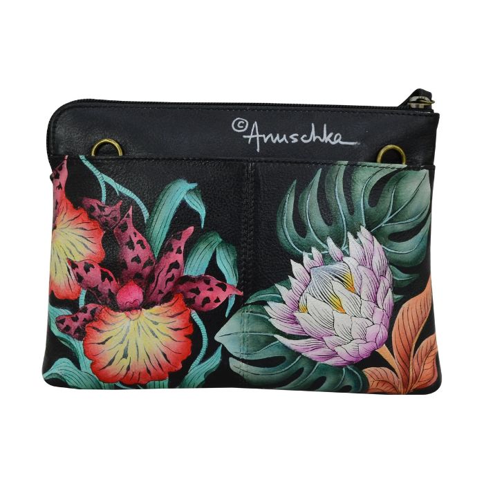 Rear exterior of black leather handbag with bronze hardware loops and a vibrant, hand painted floral pattern. 