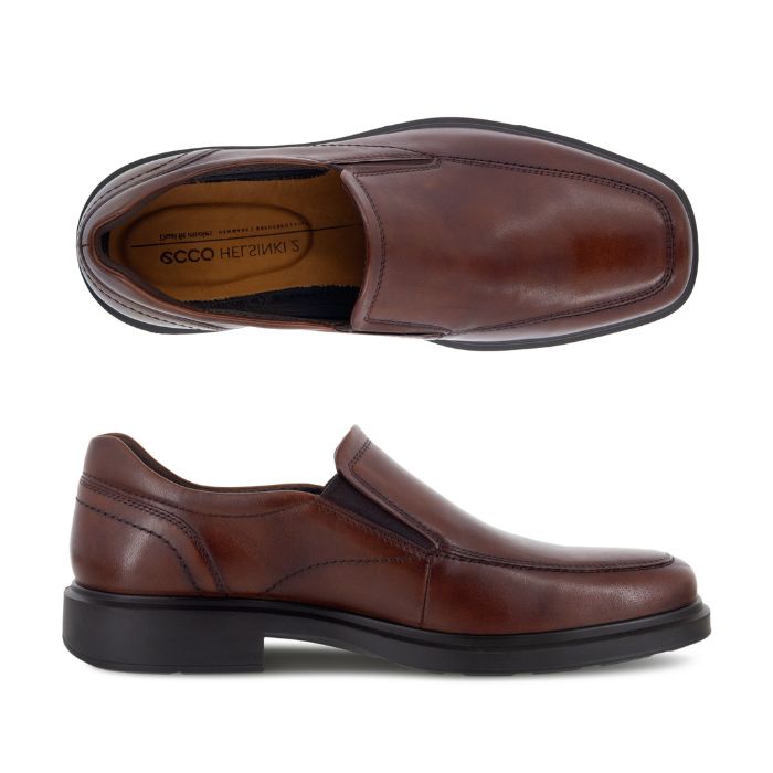 A pair of Ecco brown leather slip on dress shoes apron stitching and a square toe. Outsole is black.