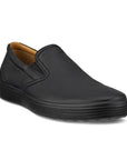 An Ecco black leather slip-on with a black midsole and a tan brown lining. 