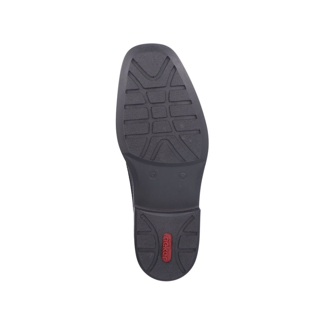 Rieker B0873 Slip-On Dress Shoe outsole with durable tread pattern and red Rieker logo, ensuring grip and stability.