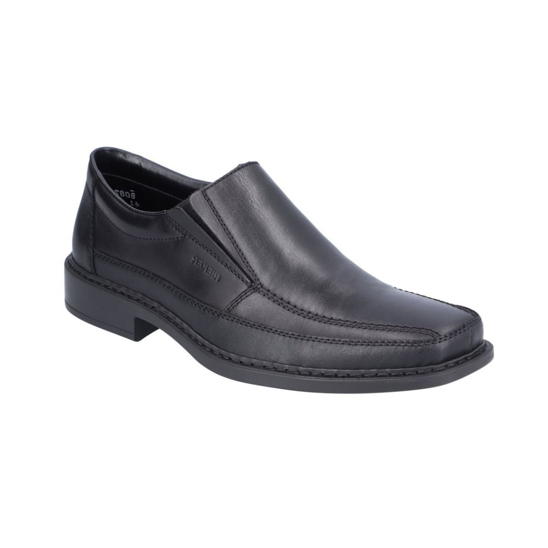 Rieker B0873 Slip-On Dress Shoe in black leather with a sleek design and lightweight sole, ideal for formal and casual wear.